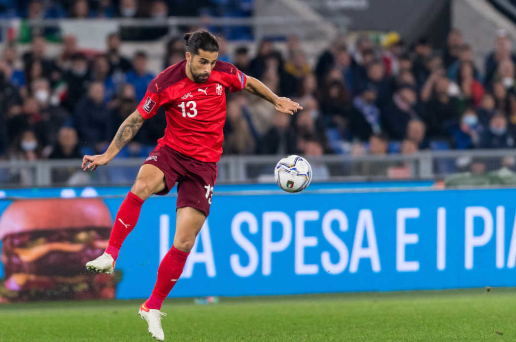 Ricardo Rodriguez, football player of Switzerland, in a position in mid air with ball